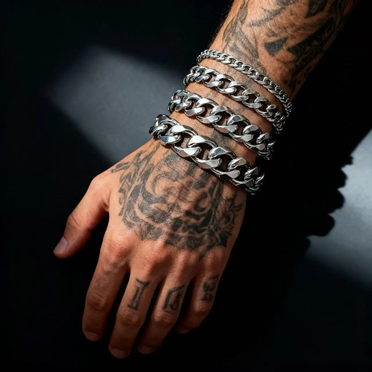 The District Cuban Bracelet in silver, worn on wrist alternate angle