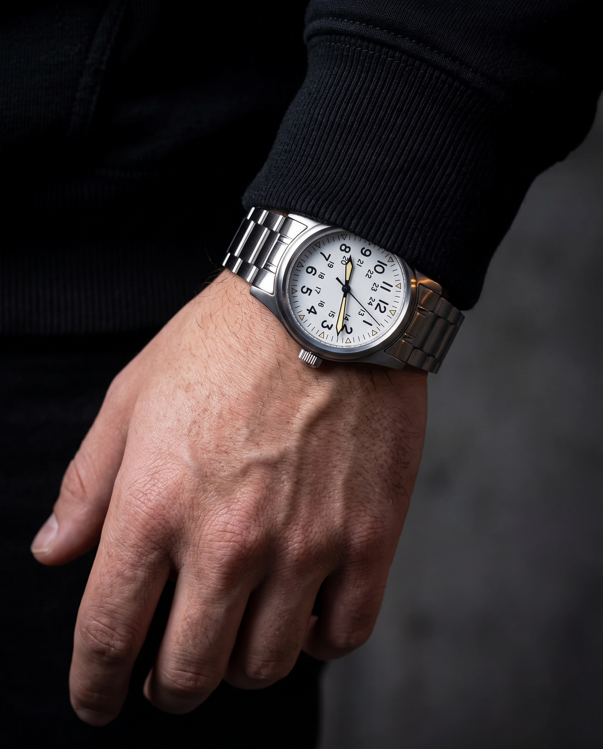 The Sentinel Watch in White, on-model wrist campaign image, dark streetwear styling