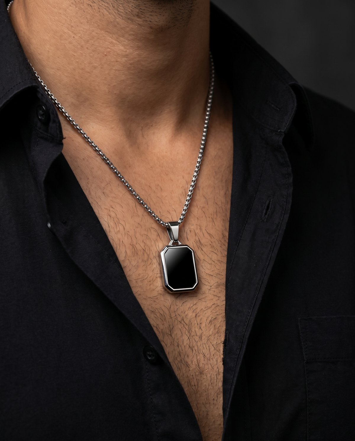 Stone Pendant (Onyx) worn on chest, dark editorial