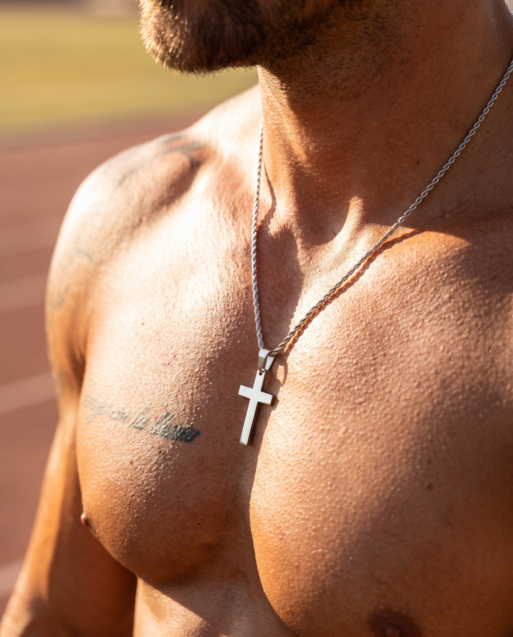 Rope Cross Necklace worn on bare chest, sunlit, dark editorial