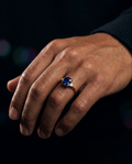 The Accent Ring worn on hand, dark editorial styling
