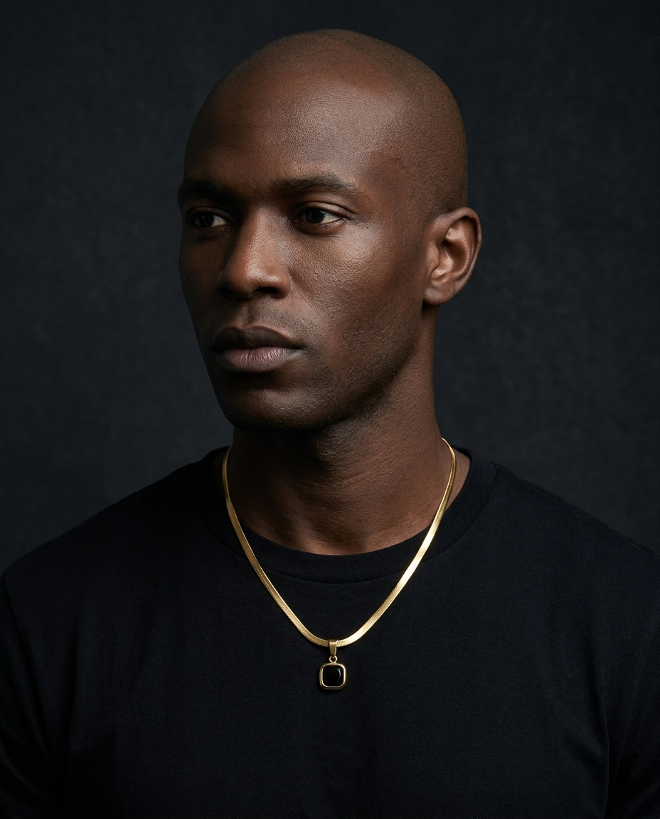 The Facet Pendant worn on model, dark editorial styling
