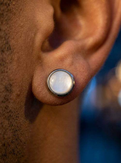 The Aurora Statement Studs, close-up detail on ear